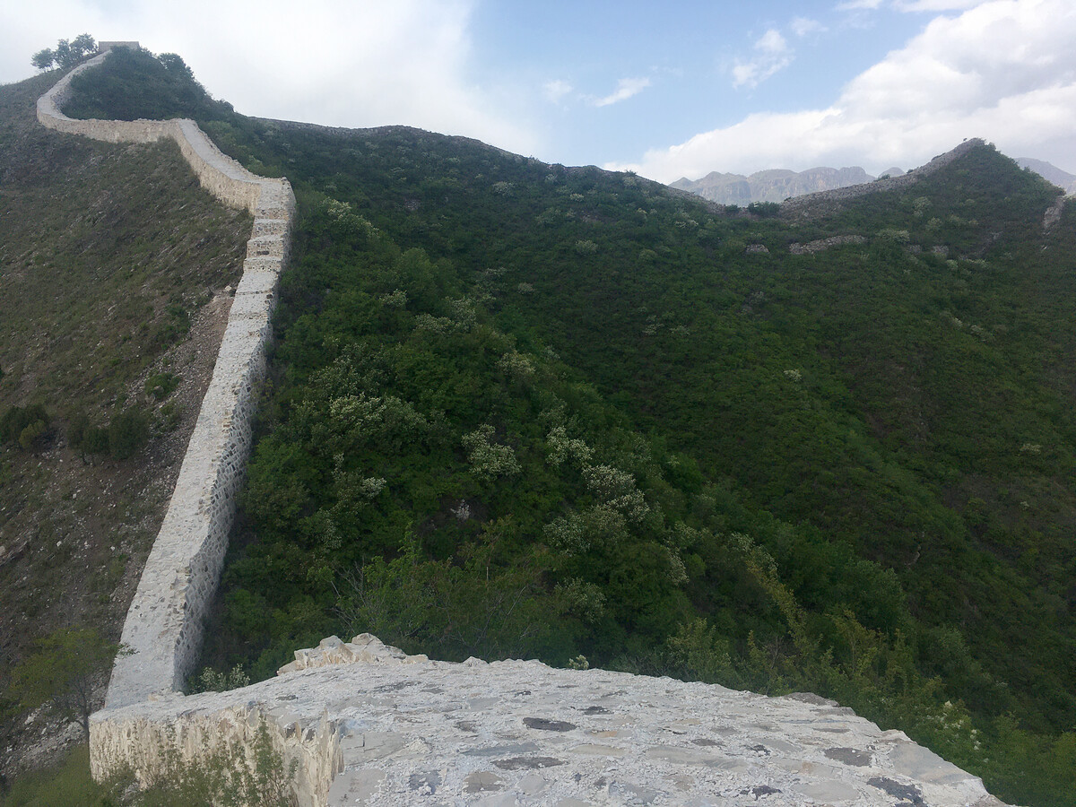 Great Wall leads up to a peak.