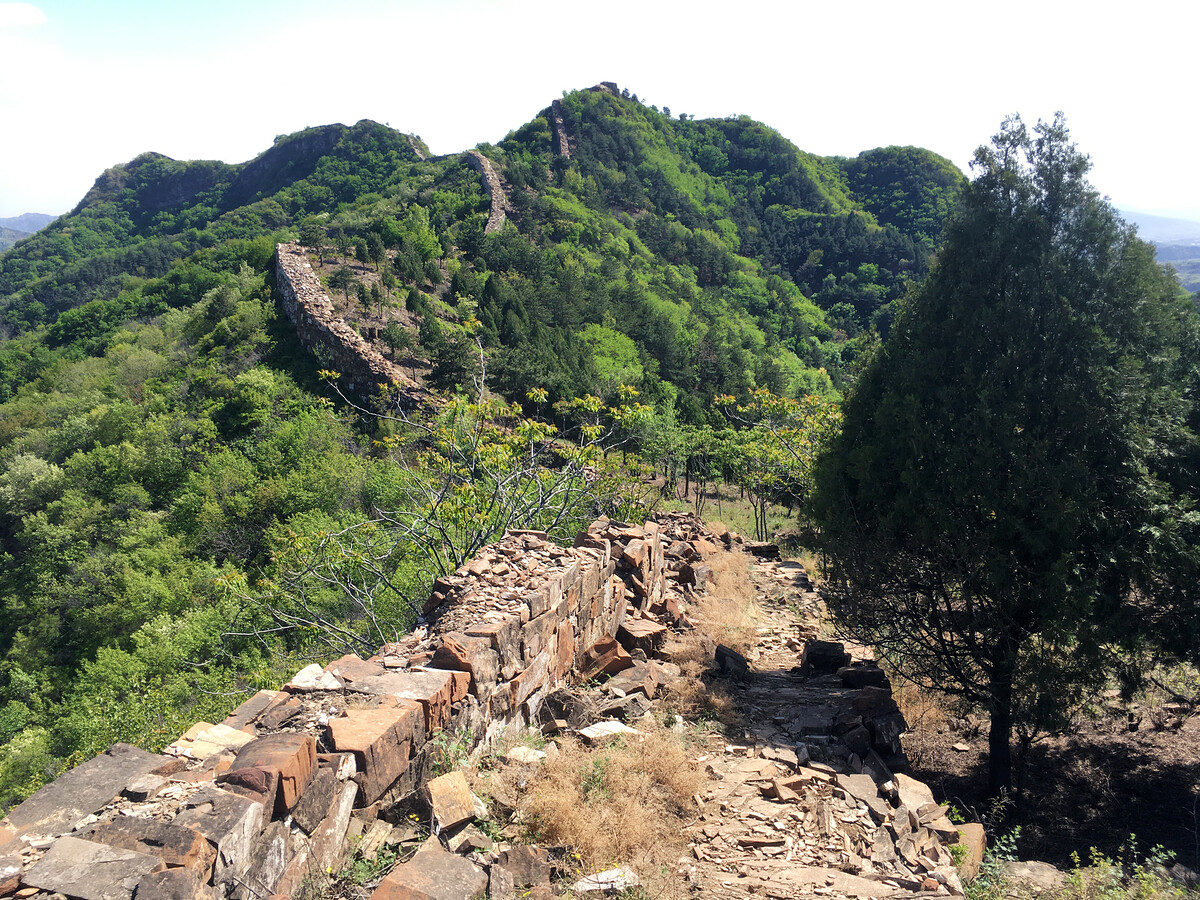 The Great Wall runs up and down the ridgeline.