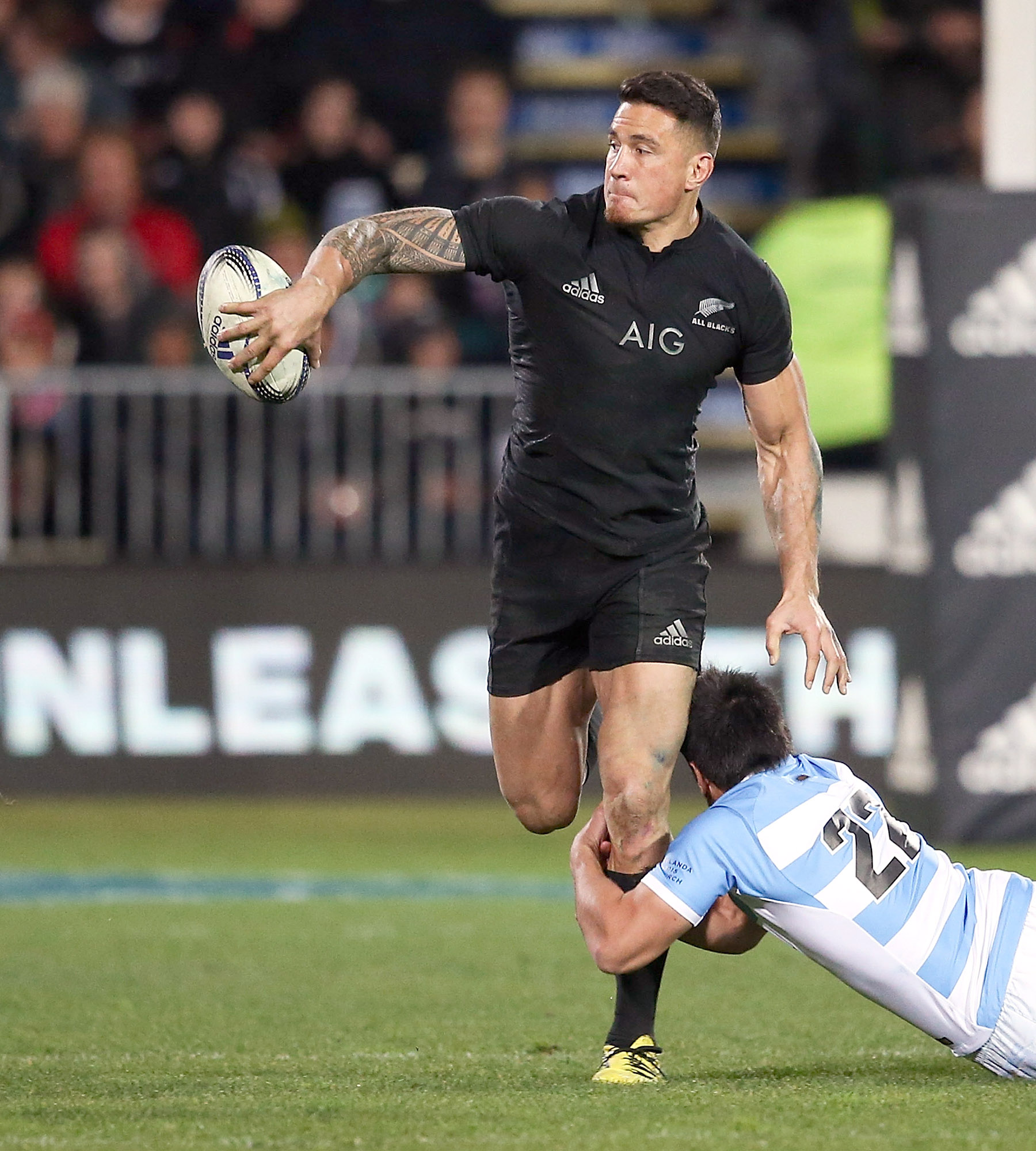 Sonny Bill Williams of the New Zealand All Blacks is tackled by Santiago Gonzalez Iglesias of Argentina during The Rugby Championship match between the New Zealand All Blacks and Argentina at AMI Stadium on July 17, 2015 in Christchurch, New Zealand.  (Photo by Martin Hunter/Getty Images)