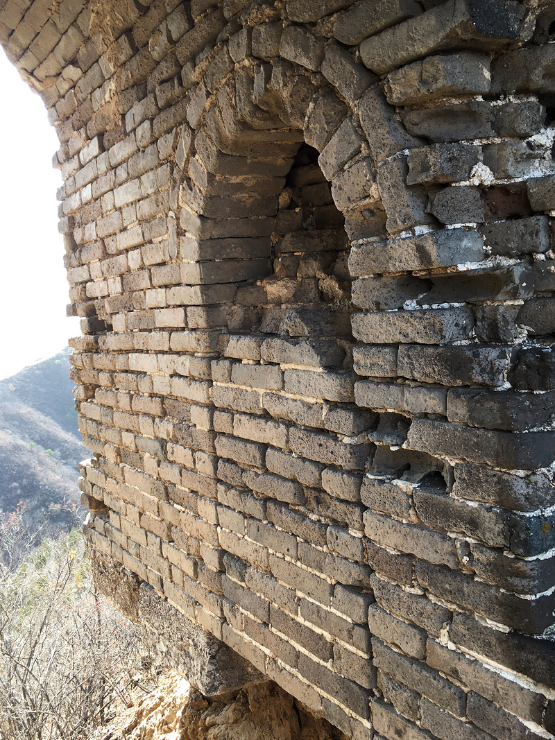 The filled arch on the south side of the hidden arch.