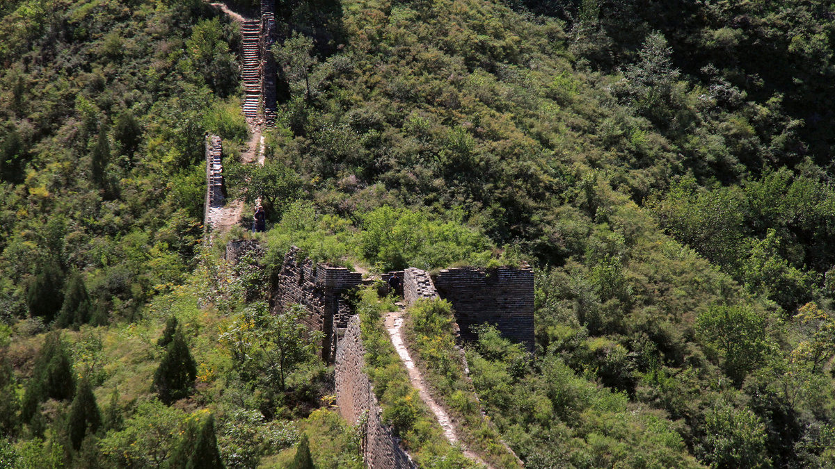 Gubeikou Great Wall surrounded by green in summer.