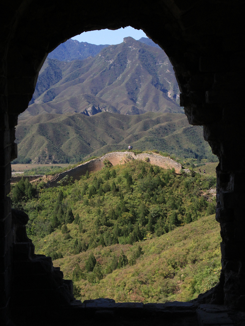 View through an arched window in a Great Wall tower.