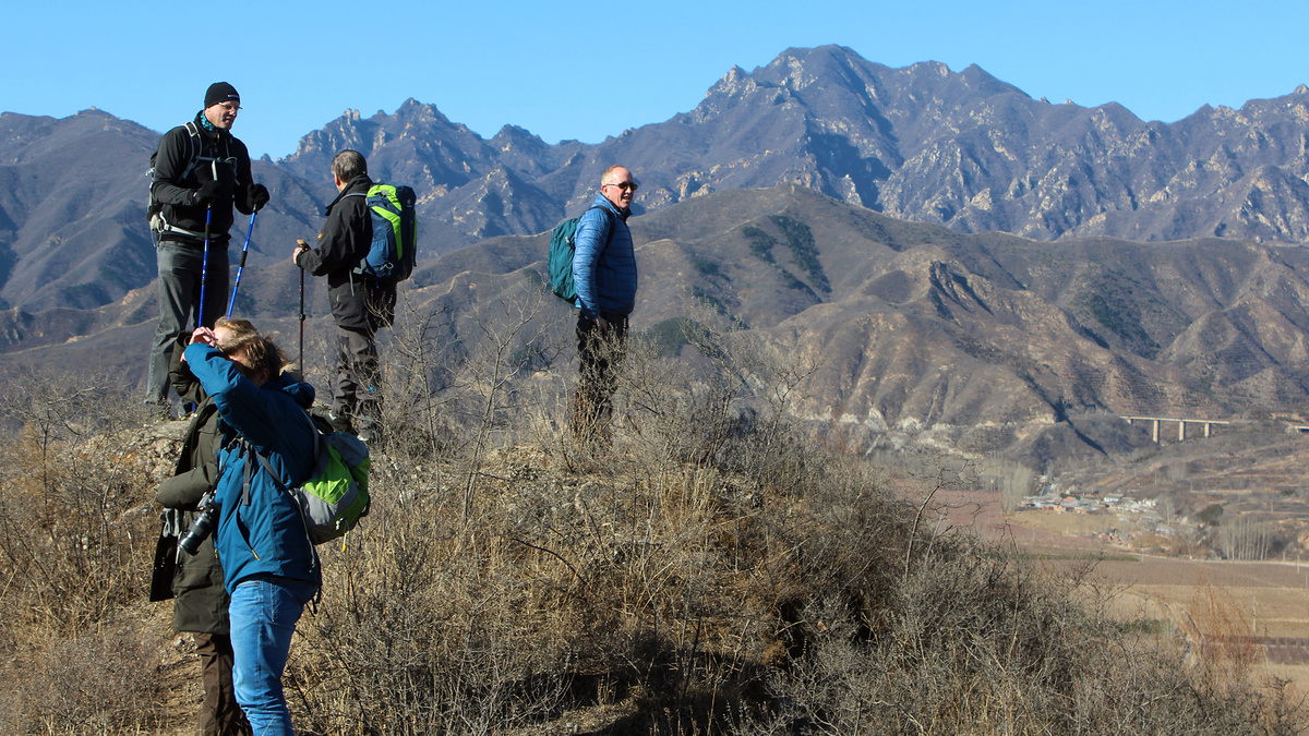 Hikers on hills.