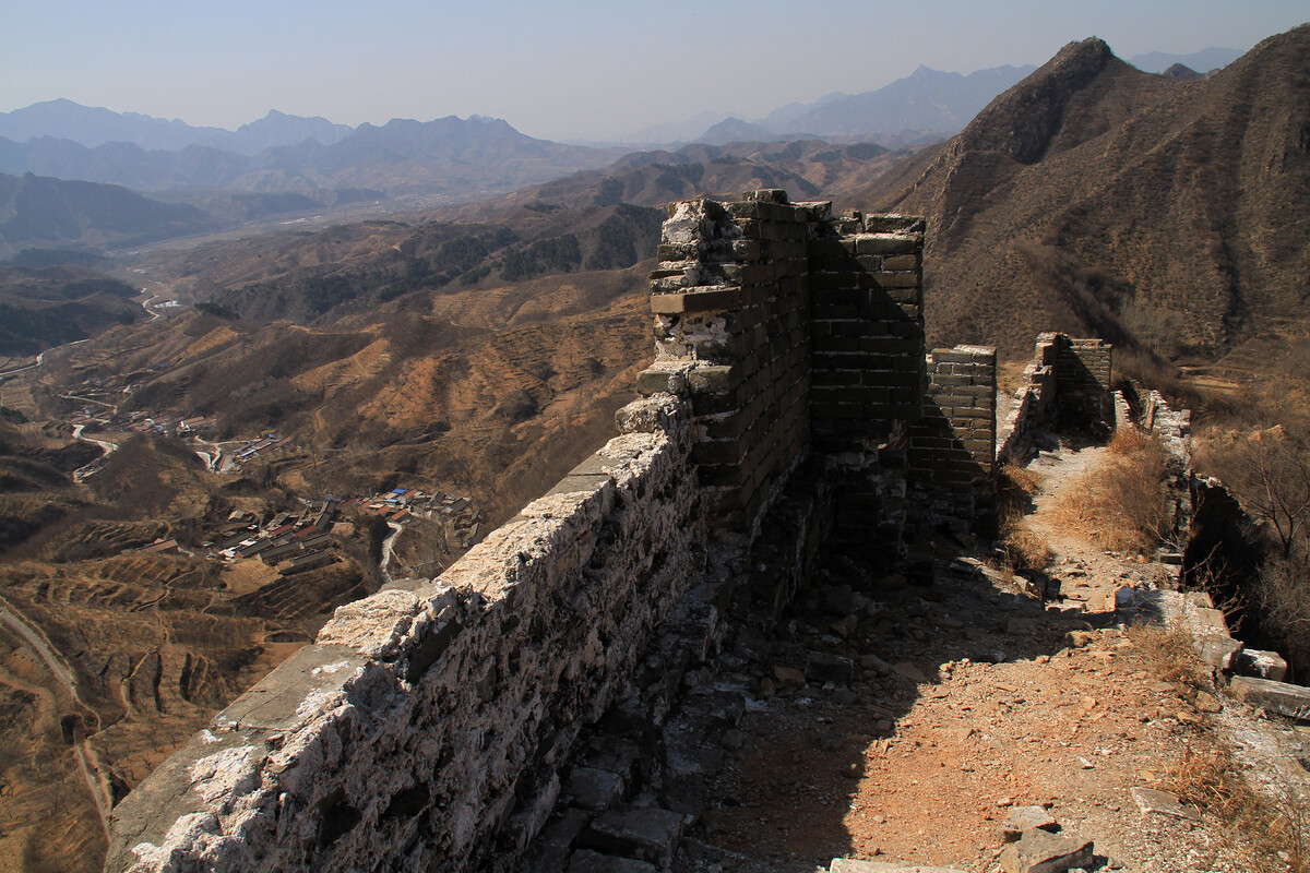 Views of farmland and villages with Great Wall in the foreground