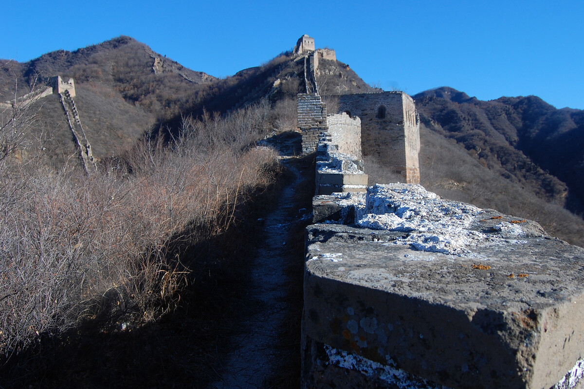 Great Wall battlements with towers beyond.
