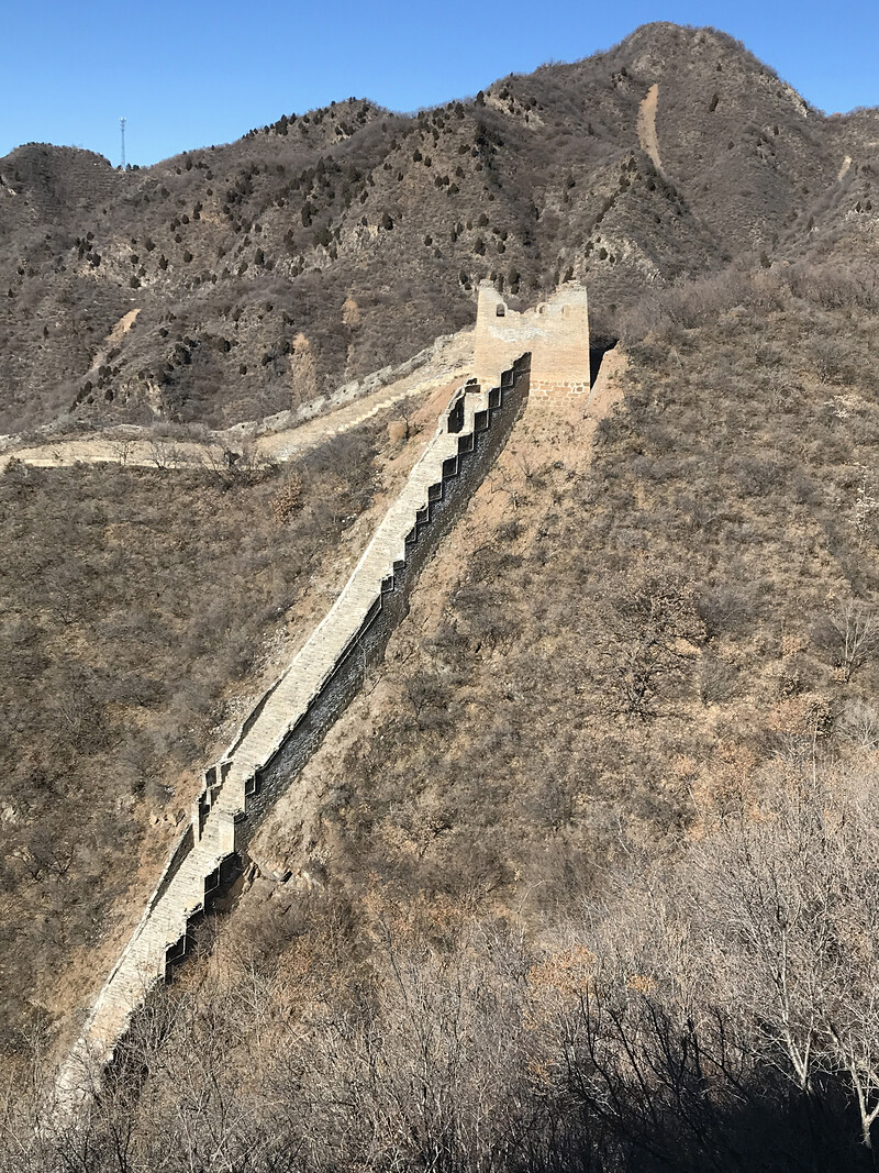 A tower at the top of a steep section of Great Wall.
