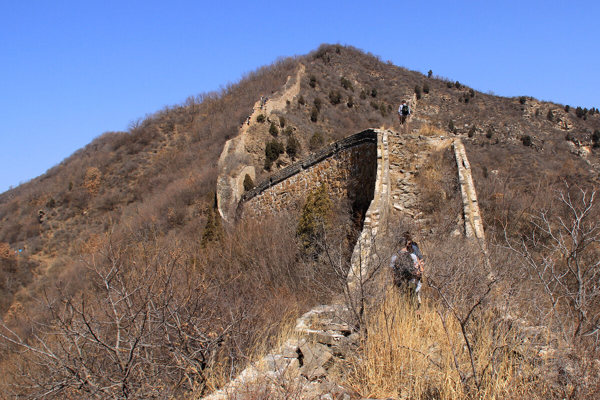 Stone Great Wall with brick battlements.